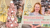 Winterdekoration Baum mit Moos