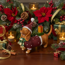 Artikel Dekofigur Dackel aus Polyresin 18 cm mit Geschenkpaket und Weihnachtsmütze