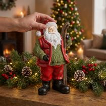 Artikel Weihnachtsmann Dekofigur mit Ski aus Polyresin 14×10,5×24,5cm Rot/Grün