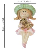 Artikel Kantenhocker Mädchen mit Hund aus Polyresin Ø4,5cm H9,5cm in Rosa und Grün