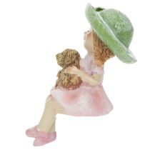 Artikel Kantenhocker Mädchen mit Hund aus Polyresin Ø4,5cm H9,5cm in Rosa und Grün