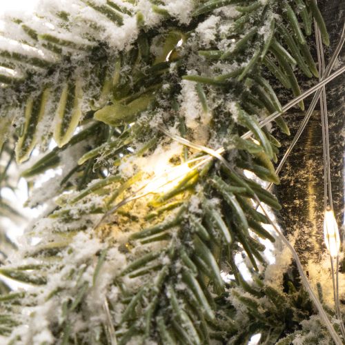 Künstliche beschneite Tanne mit LED-Lichtern im Jutesack 50 cm innen | Floristik24.at