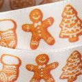 Geschenkband mit Lebkuchenfiguren aus Polyester, 25 mm x 18 m, Weiß-Orange | Floristik24.at