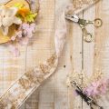 Geschenkband aus Polyester mit Pflanzenmotiven 40 mm x 20 m Creme Gold | Floristik24.at
