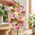 Künstlicher Orchideenzweig aus Kunststoff und Textilfasern Grün Pink H49cm | Floristik24.at