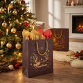 Geschenktüte aus Papier mit Geweih-Motiv in Braun und Gold, 18x10x23 cm | Floristik24.at
